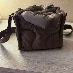 Thirty years taupe puffer bag
